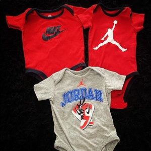 Jordan and Nike onesies